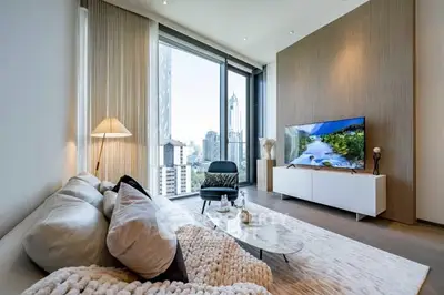 Luxurious modern living room with stunning city view and elegant decor