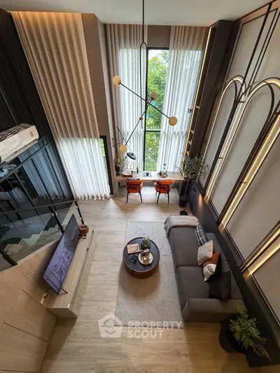 Luxurious modern living room with high ceilings and elegant decor