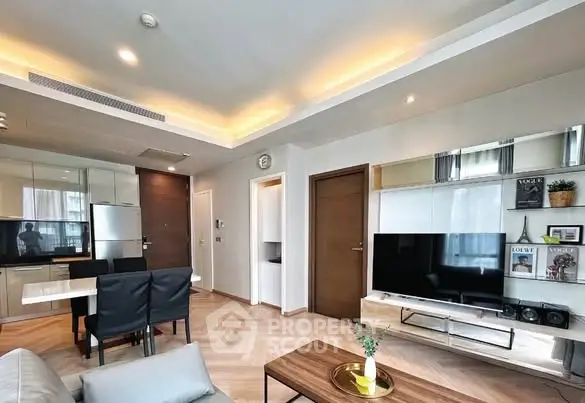 Modern living room with stylish decor, open layout, and elegant lighting in a contemporary apartment.