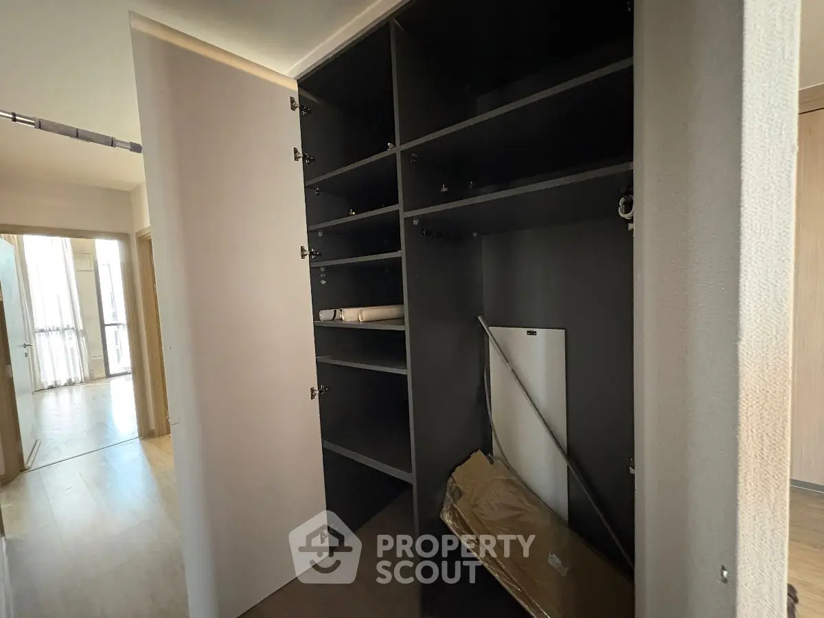 Spacious built-in storage closet in modern apartment hallway