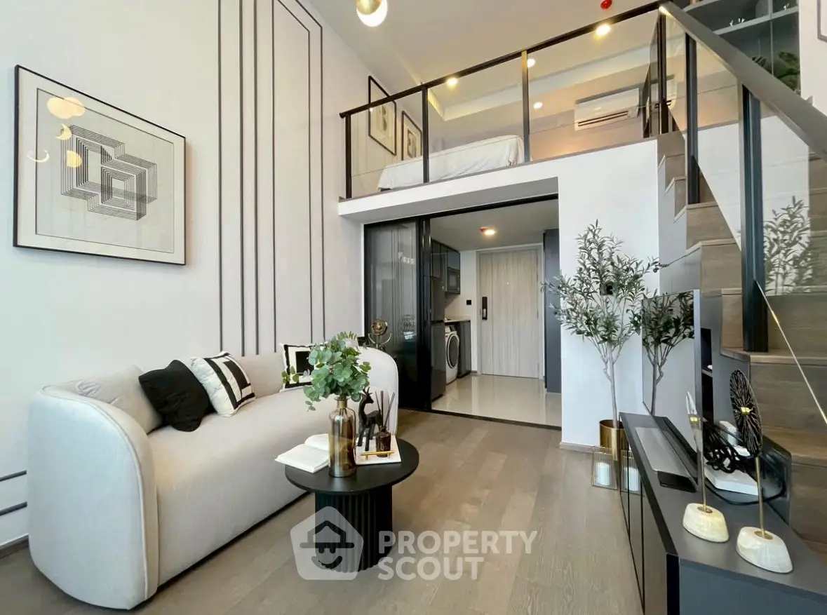 Modern loft apartment with stylish living room and mezzanine bedroom