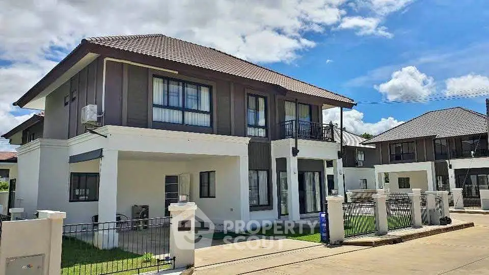 Stunning modern two-story house with elegant design and spacious outdoor area in a serene neighborhood.