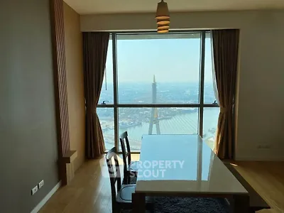 Stunning dining area with panoramic city view and elegant decor