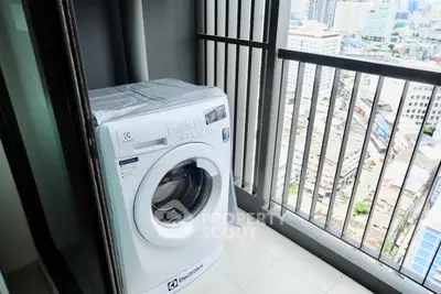 Modern balcony with washing machine and city view, perfect for urban living.