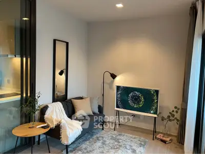 Modern living room with sleek decor and stylish lighting