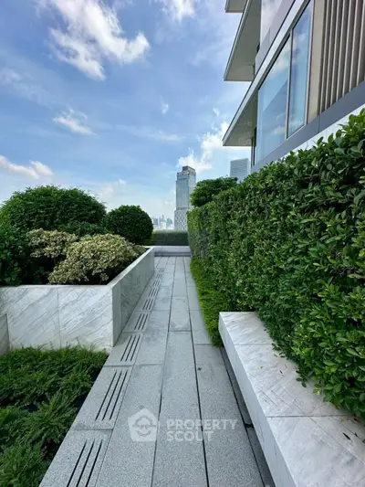 Luxurious rooftop garden with stunning city views and modern architecture.