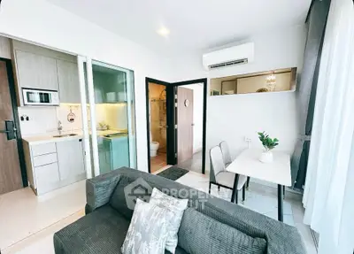 Modern apartment interior with open kitchen and cozy living area