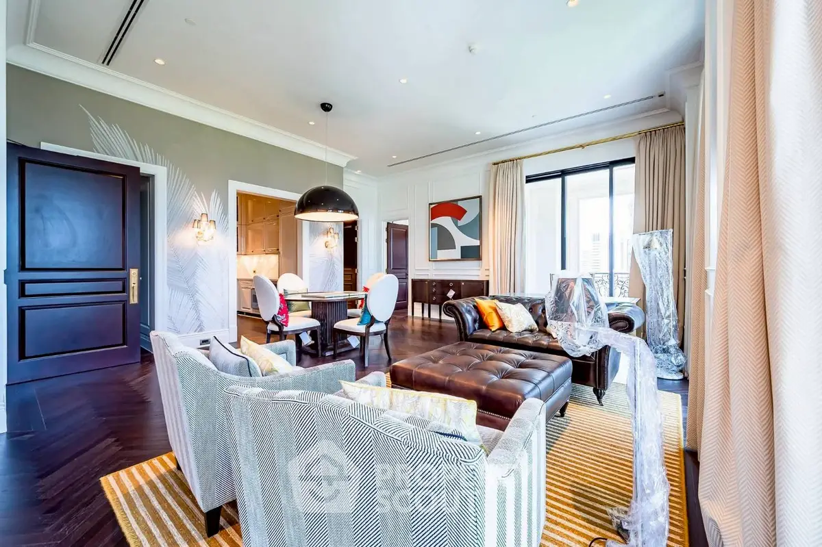 Luxurious living room with elegant decor and stylish furniture in a modern apartment.