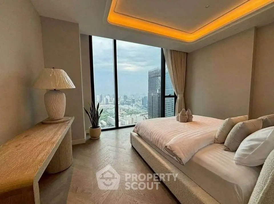 Luxurious bedroom with stunning city view and modern decor