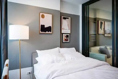 Modern bedroom with stylish decor and cozy ambiance