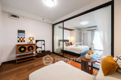 Stylish modern bedroom with glass partition and elegant decor