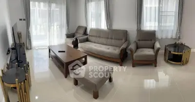 Spacious modern living room with elegant furniture and natural light