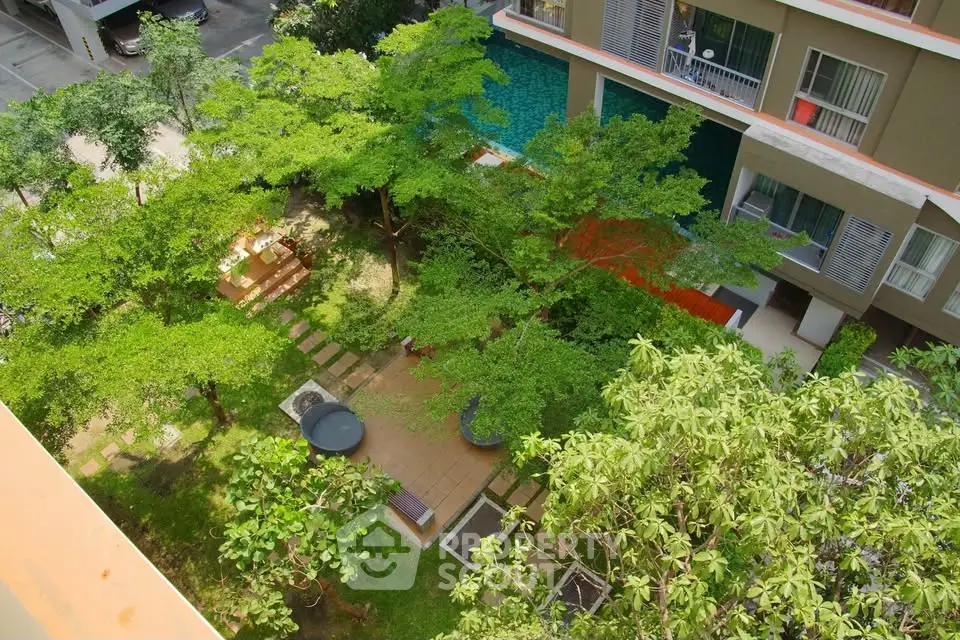 Lush garden view from above in modern residential complex