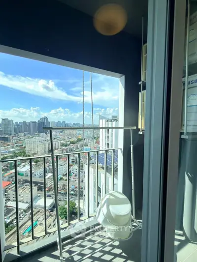 Stunning high-rise balcony with panoramic city views, perfect for urban living enthusiasts.