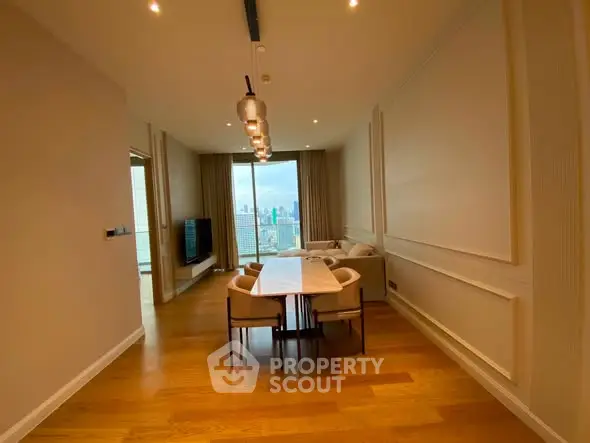 Spacious modern living room with city view and elegant dining area