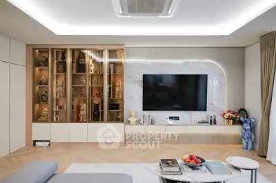 Luxurious modern living room with stylish decor and built-in shelving