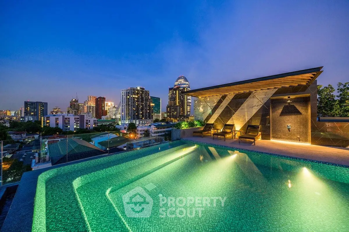 Luxurious rooftop pool with stunning city skyline view at dusk