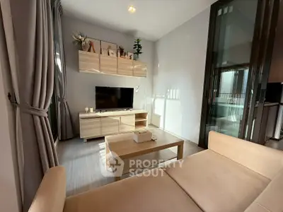 Modern living room with cozy beige sofa and stylish wooden furniture