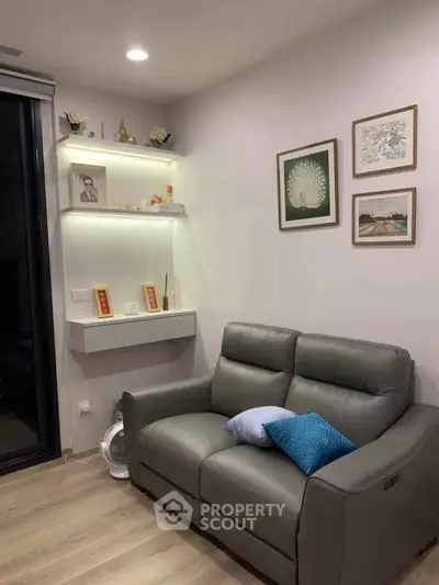 Cozy living room with modern decor and comfortable seating, perfect for relaxation.