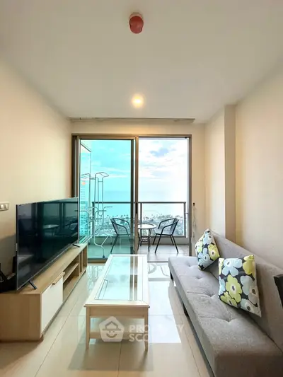 Modern living room with balcony view in high-rise apartment