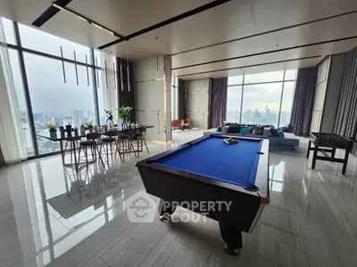 Luxurious penthouse with pool table and panoramic city views