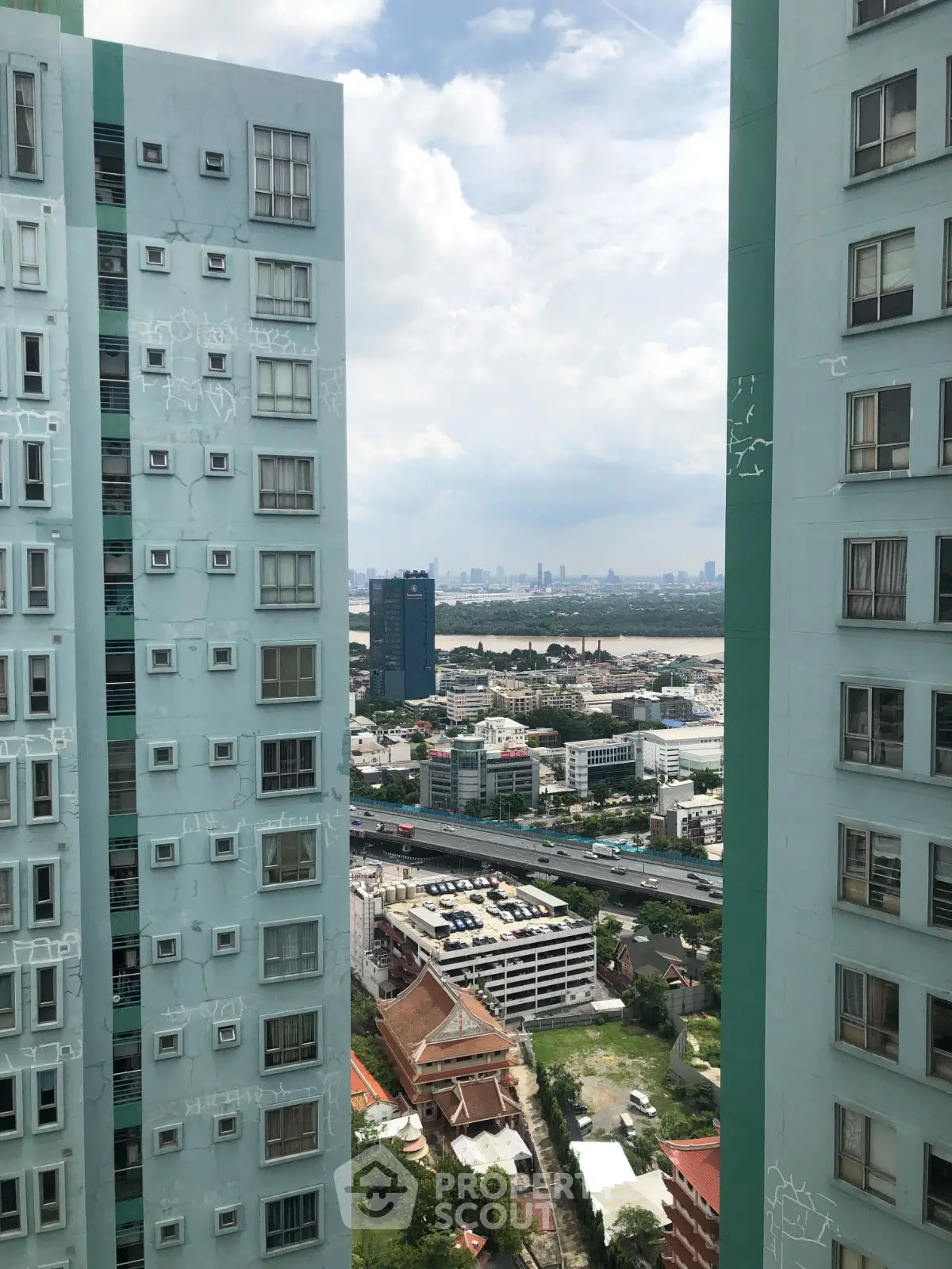 Stunning cityscape view between high-rise buildings with clear sky