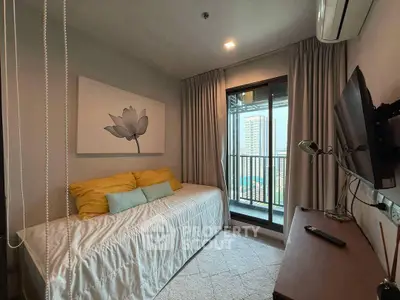 Cozy bedroom with balcony view in modern apartment