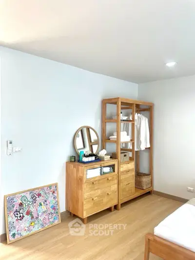 Modern bedroom with wooden furniture and stylish decor