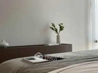 Elegant bedroom with modern decor and soft lighting