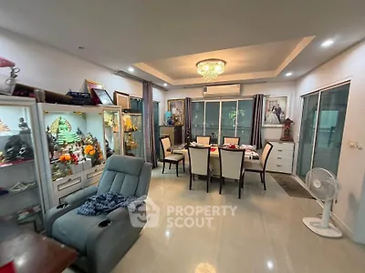 Spacious living room with elegant dining area and modern decor