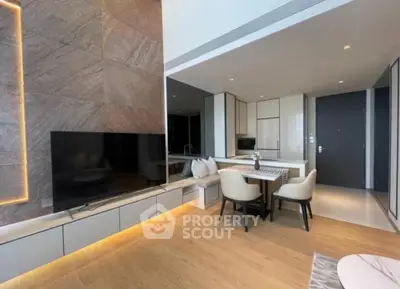 Modern living room with sleek design and open kitchen layout