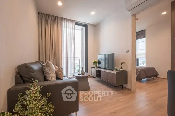 Modern living room with sleek furniture and natural light