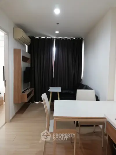 Modern living room with sleek furniture and natural light