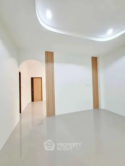 Spacious modern interior with sleek design and elegant lighting, perfect for contemporary living.