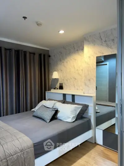 Modern bedroom with stylish decor and cozy ambiance