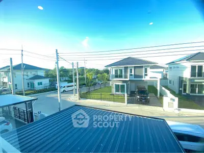 Modern suburban neighborhood with stylish houses and clear blue sky view.