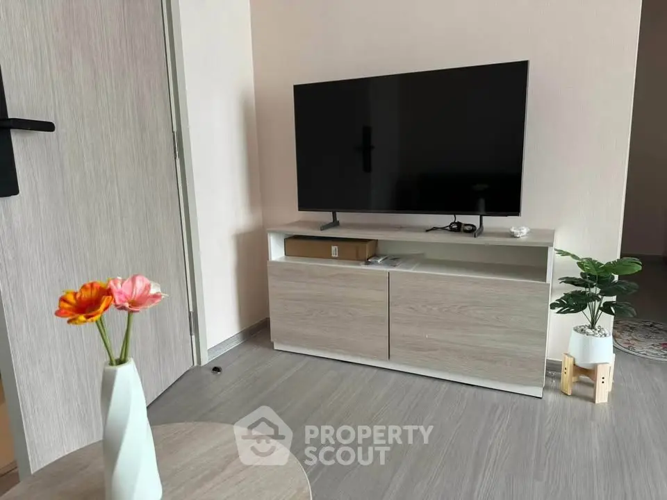 Modern living room with sleek TV stand and stylish decor