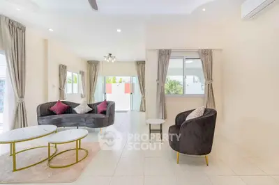 Spacious modern living room with elegant furniture and natural light