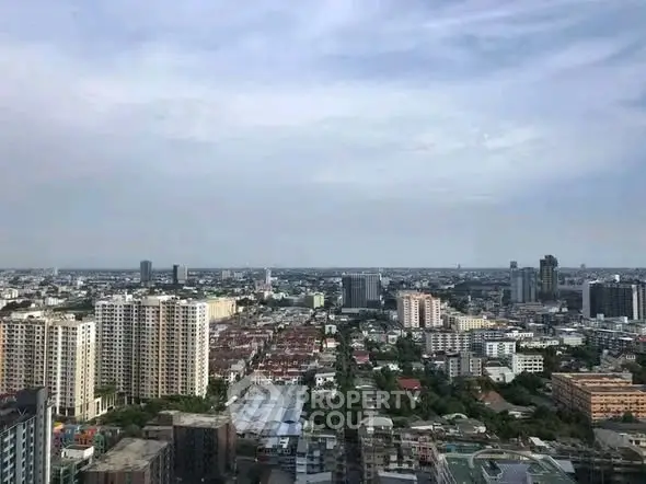 Stunning cityscape view from a high-rise building showcasing urban living and skyline.