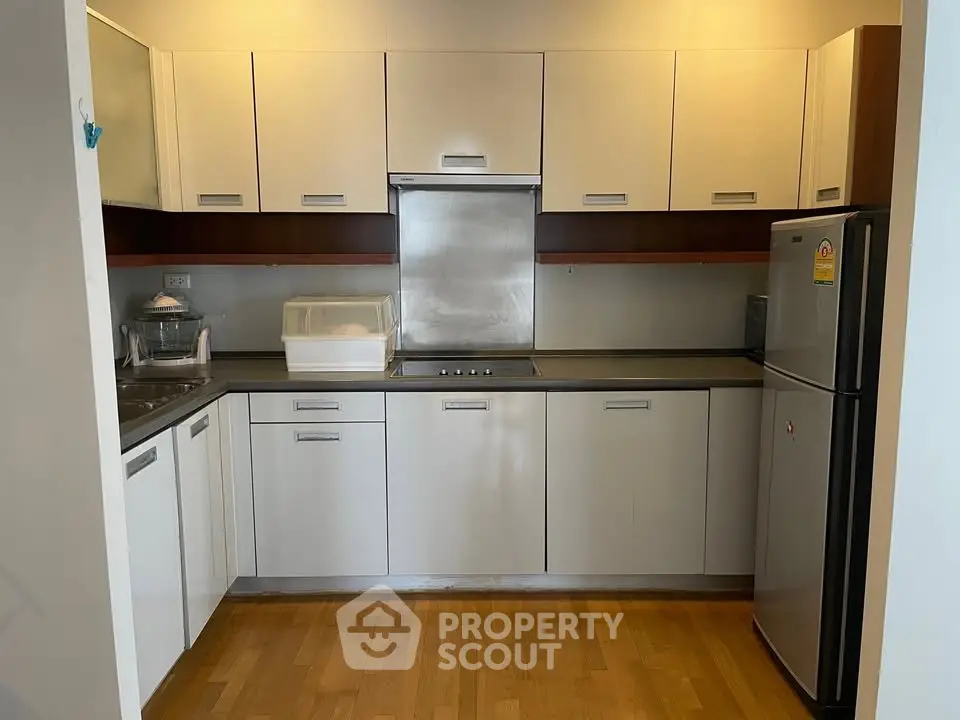 Modern kitchen with sleek cabinetry and stainless steel appliances
