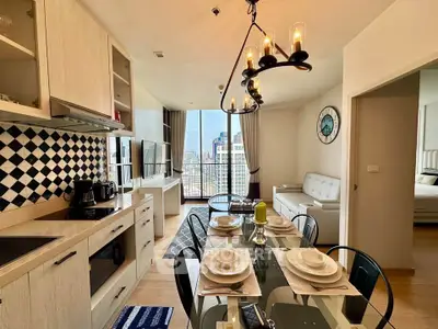 Modern open-plan kitchen and dining area with city view, stylish decor, and cozy living space.