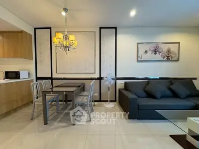 Modern living room with elegant dining area and stylish decor