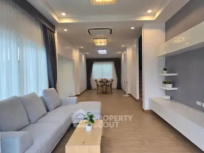 Spacious modern living room with elegant decor and natural light