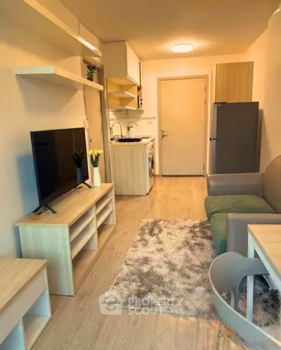 Cozy modern living room with open kitchen and stylish decor