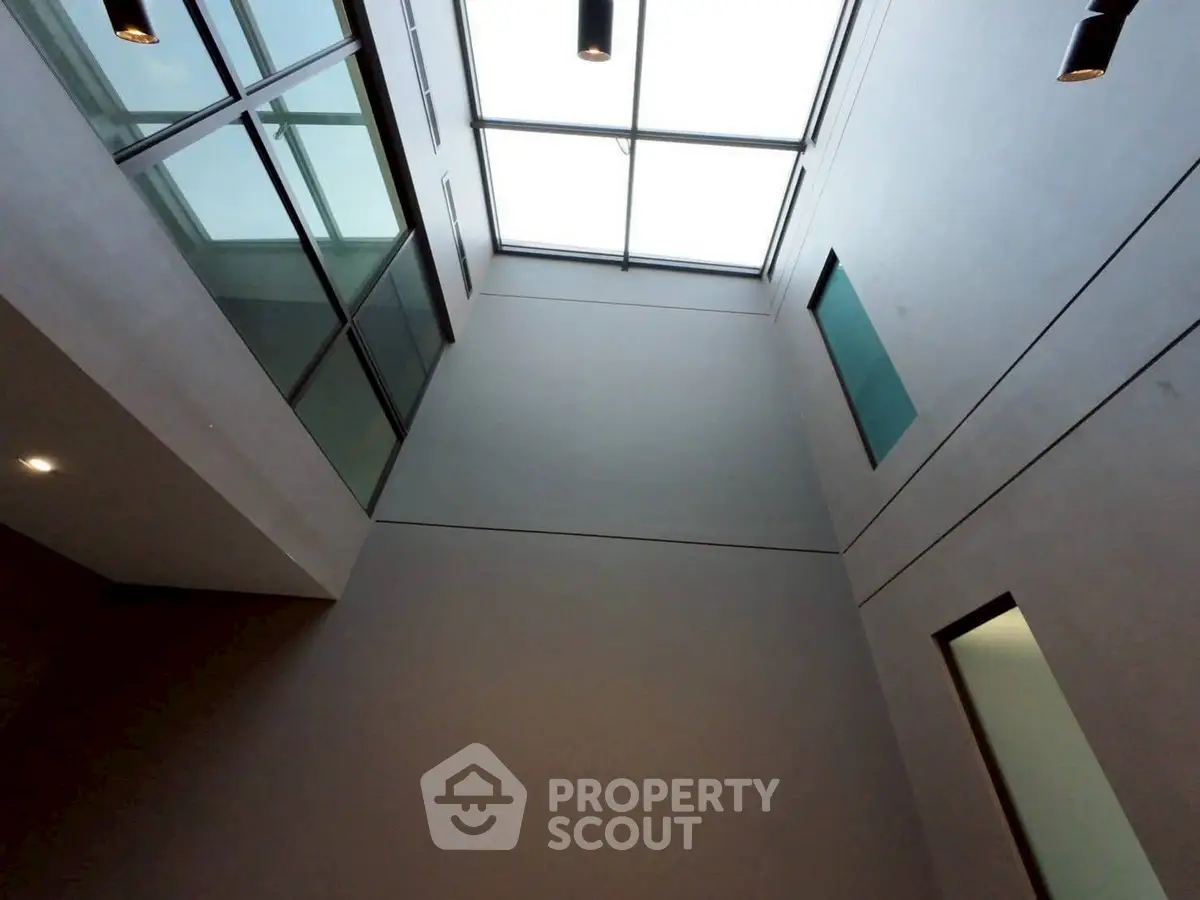 Modern building interior with high ceiling and skylight