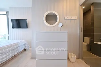 Modern bedroom with stylish decor and ensuite bathroom