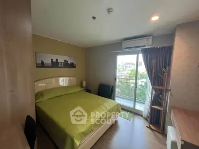Cozy bedroom with balcony view in modern apartment