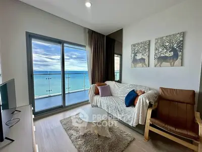 Stunning living room with ocean view and modern decor in a high-rise apartment.