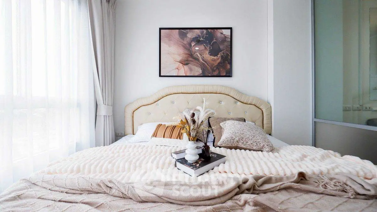 Luxurious bedroom with elegant decor and natural light