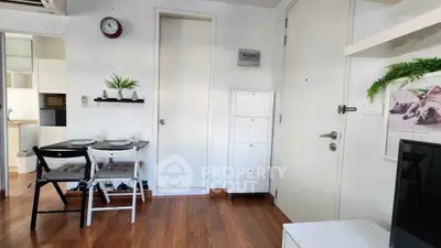 Charming modern apartment interior with dining area and stylish decor, perfect for urban living.